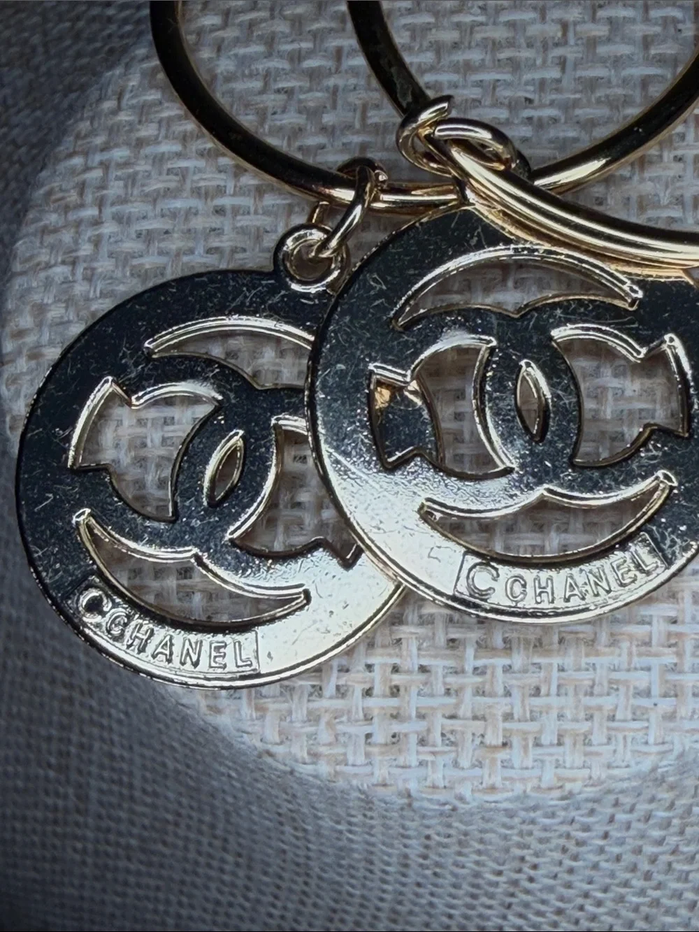CC Gold Tone Hoop Earrings with Pink Emblem and Crystal Accents
